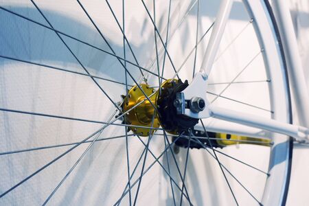 Bike as the interior hangs on the wall. Pedals and wheel.の写真素材