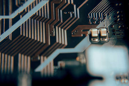 Close up. Young Man Repairing Motherboard from PC. Repair Shop. Worker with Tools. Computer...