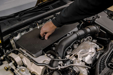 Interior of the car, car repair, service. Under the bumper of the car. Photos of the spare parts of...