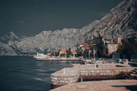 Montenegro. Dobrota 09.24.2021. Streets of montenegro, houses near the water houses in the mountains. Streets and alleys.の写真素材