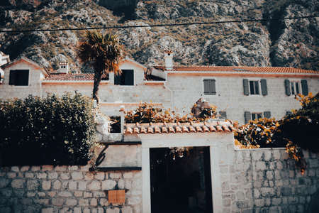 Montenegro. Dobrota 09.24.2021. Streets of montenegro, houses near the water houses in the...