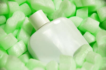 Styrofoam granular packaging filler for parcels, Protective Packaging. Glass perfume protection, sterilized glasses. Green packagingの写真素材