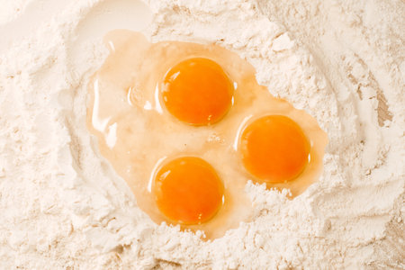 Cooking homemade dough, flour and eggs on the table. Cooking at home, recipes, diet. Pie or cake dough, sweet.の写真素材