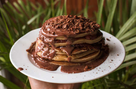 Homemade pancakes with nothing on the plate. Recipe for homemade pancakes, food in the kitchen, only from a frying pan. Food with chocolate and jam, dietの写真素材