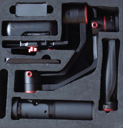 Cracow. Poland. 01/31/2022. Stabilizer in feiyutech a2000 backpack. Camera work, videographer.のeditorial素材