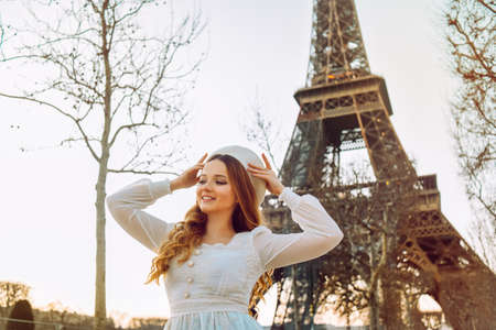 Traveler and tourist in Paris with the Eiffel Tower in the background. model pose.の写真素材