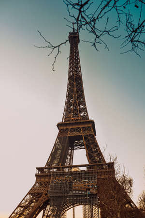 PARIS, FRANCE, March 8, 2022. The Eiffel Tower against a perfectly blue sky. Beauty travel in Paris, touristic place.のeditorial素材
