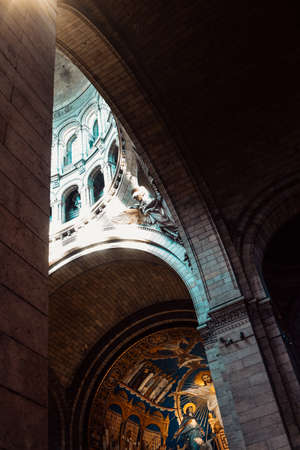 PARIS, FRANCE, 08/03/2022 Basilica SacrÃ©-Coeur church inside, incredible beauty place in Paris. Very beautiful falling lightのeditorial素材