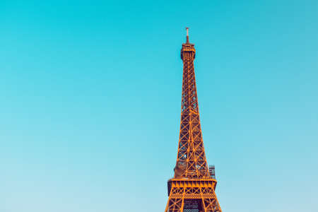PARIS, FRANCE, March 8, 2022. The Eiffel Tower against a perfectly blue sky. Beauty travel in Paris, touristic place.のeditorial素材