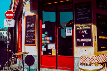 PARIS, FRANCE, March 8, 2022. famous cafe two mills on rue Lepic, Montmartre. Cafe two mills (Cafe des Deux Moulins) from the film about Amelie, one of the attractions of Parisのeditorial素材