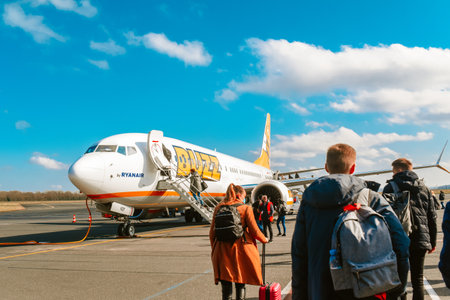 France. Paris. 10/03/2022. Buzz plane at the airport. Airplane getting ready to take off People are landingのeditorial素材
