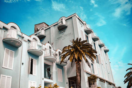 Montenegro. Tivat. 05/16/2022. Palm hotel with round balconies.のeditorial素材