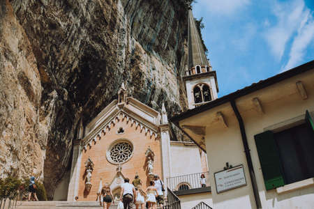 Italy, Spiazzi 07/09/2022 Santuario Basilica Madonna della Corona. Path to the church on top of the mountain monumentの写真素材