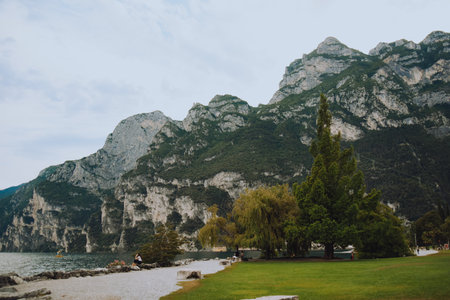 Riva del Garda. mountains beauty and vacation, summer day, travel. Water and lake beauty of nature, relaxion vibeの写真素材
