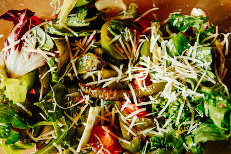 Salad close-up, cheese and lettuce and many vegetables. Healthy food.の写真素材