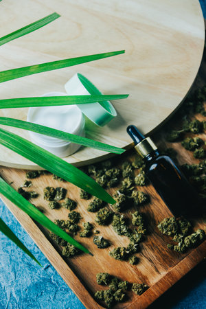 Glass bottle for marijuana oil, cosmetics with pipette. Cream and cosmetics with drugs, medicine and treatment. Beauty and health cbd.の写真素材