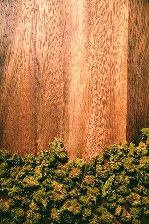 Marijuana in cones on a tree. Background cbd and tgc marijuana product. Space for your product or text. Background drugsの写真素材