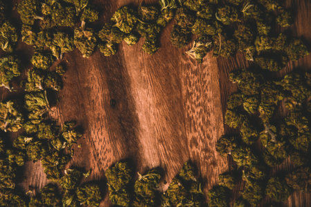 Marijuana in cones on a tree. Background cbd and tgc marijuana product. Space for your product or...