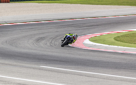 Valentino Rossi of Yamaha Factory team racing. Misano, September 14, 2014のeditorial素材