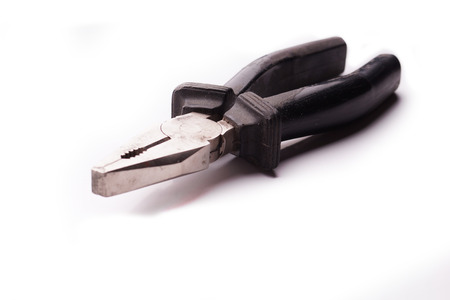 Old pliers isolated on white background and clipping pathの写真素材
