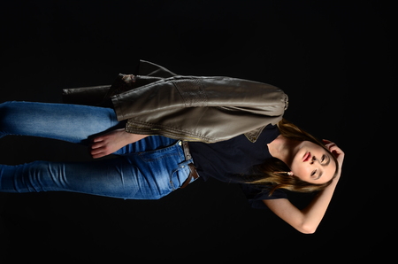 Fashion photo of beauty woman on dark backgroundの写真素材