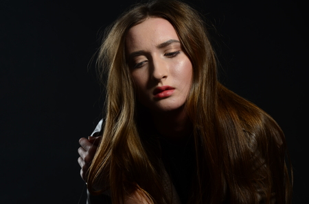 Fashion photo of beauty woman on dark background