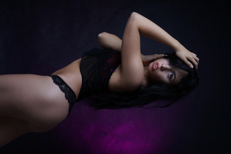 Young beautiful woman in a fashionable linen luxury brunette in the Studio