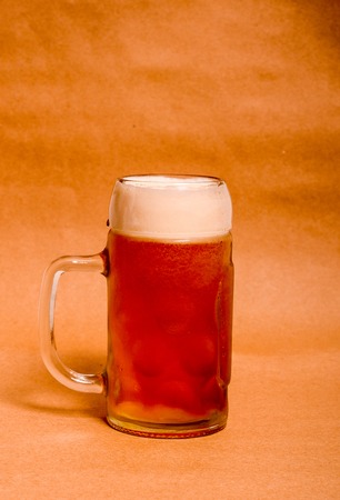 Variety of different beers, of different colors and alcoholic strengths in different shaped glasses suited to different personalitiesの写真素材