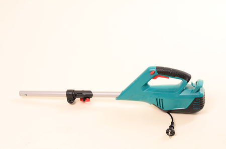 weed trimmer, lawn mower, brush cutter, closeup, isolated on white background, clipping path...