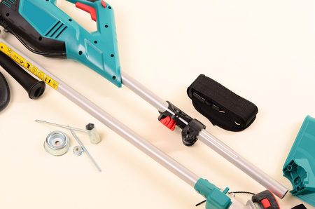 weed trimmer, lawn mower, brush cutter, closeup, isolated on white background, clipping path...