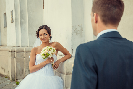 Ukraine, Lutsk - 09.08.2014: the Wedding ceremony. Lovers of nature walks in Park. Beautiful delicate and romantic couples, loving each other. Editorial reportage typical wedding.のeditorial素材