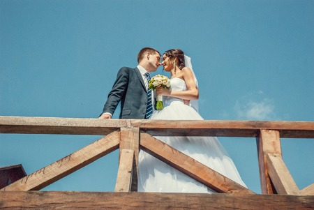 Ukraine, Lutsk - 09.08.2014: the Wedding ceremony. Lovers of nature walks in Park. Beautiful delicate and romantic couples, loving each other. Editorial reportage typical wedding.のeditorial素材