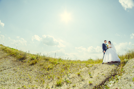 Ukraine, Lutsk - 09.08.2014: the Wedding ceremony. Lovers of nature walks in Park. Beautiful delicate and romantic couples, loving each other. Editorial reportage typical wedding.のeditorial素材