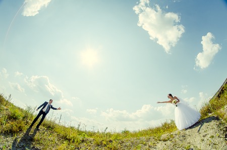 Ukraine, Lutsk - 09.08.2014: the Wedding ceremony. Lovers of nature walks in Park. Beautiful delicate and romantic couples, loving each other. Editorial reportage typical wedding.のeditorial素材