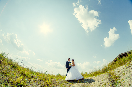 Ukraine, Lutsk - 09.08.2014: the Wedding ceremony. Lovers of nature walks in Park. Beautiful delicate and romantic couples, loving each other. Editorial reportage typical wedding.のeditorial素材