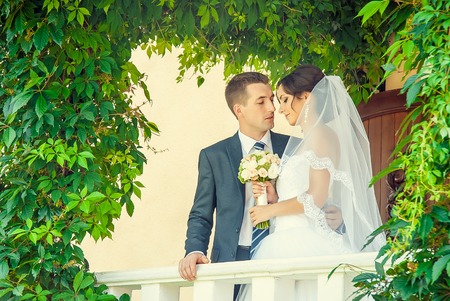 Ukraine, Lutsk - 09.08.2014: the Wedding ceremony. Lovers of nature walks in Park. Beautiful delicate and romantic couples, loving each other. Editorial reportage typical wedding.のeditorial素材
