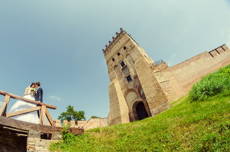 Ukraine, Lutsk - 09.08.2014: the Wedding ceremony. Lovers of nature walks in Park. Beautiful delicate and romantic couples, loving each other. Editorial reportage typical wedding.のeditorial素材