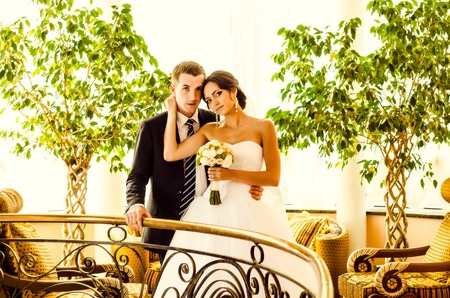 Ukraine, Lutsk - 09.08.2014: the Wedding ceremony. Lovers of nature walks in Park. Beautiful delicate and romantic couples, loving each other. Editorial reportage typical wedding.のeditorial素材