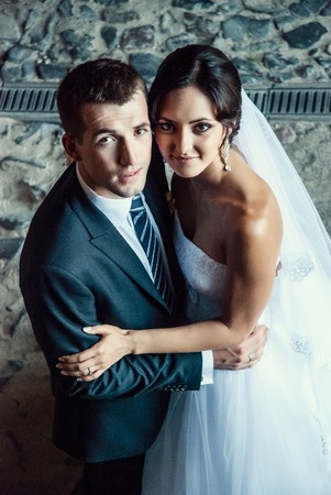 Ukraine, Lutsk - 09.08.2014: the Wedding ceremony. Lovers of nature walks in Park. Beautiful delicate and romantic couples, loving each other. Editorial reportage typical wedding.のeditorial素材