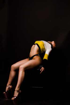 Young beautiful woman in a fashionable linen luxury brunette in the Studioの写真素材