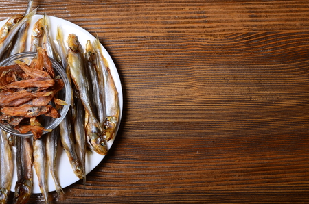 Russian snack . Beer and dried fish rime, solar, bones, vintage liquidの写真素材