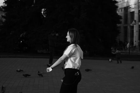 travel couple walking around city on vacation with guide book having fun Lutsk Ukraine 20.04.2018のeditorial素材