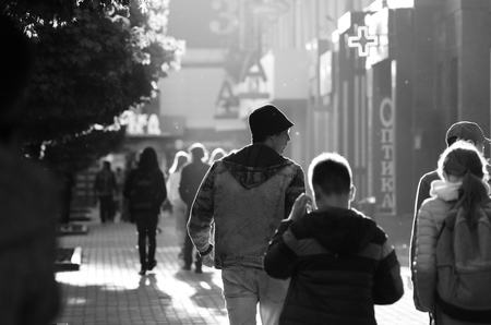 travel couple walking around city on vacation with guide book having fun Lutsk Ukraine 20.04.2018のeditorial素材