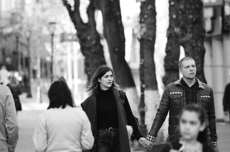 travel couple walking around city on vacation with guide book having fun Lutsk Ukraine 20.04.2018のeditorial素材