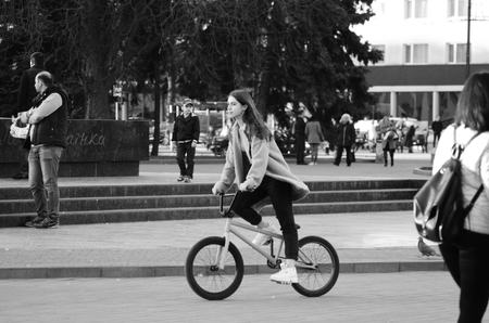 Full length of a smiling couple walking on sidewalk Lutsk Ukraine 20.04.2018.のeditorial素材