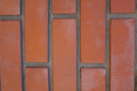 brick wall of red color, wide panorama of masonry.