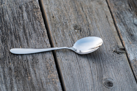 knife and fork on wooden background. Cutlery on woodenの写真素材