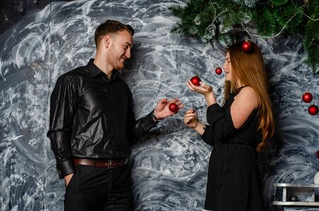 Family at Christmas with the boy. New Year photo session in the studio. Dad and his mom on holidays...