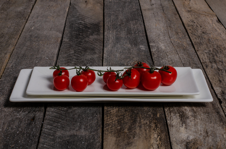 Beautiful table setting with lavender flowers on wooden background.の写真素材