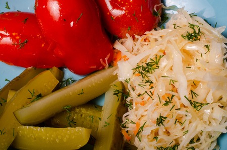 Buddha bowl with roasted butternut, hummus, shredded red cabbage, tomatoes, avocado, purple carrots, sauteed spinach, mushrooms. Healthy vegetarian appetizer or snack platter. Veggies detox lunch bowl.の写真素材
